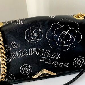 Karl lagerfeld rare bag (Chanel’s original designer).with iconic flower .